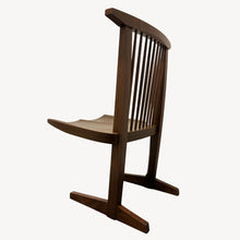 Load image into Gallery viewer, Back view of Conoid Chair showing signature wood design and minimalist structure