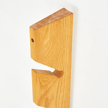 Load image into Gallery viewer, Close-up of natural ash grain on vintage Scandinavian magazine rack, showcasing minimalist craftsmanship and original finish.