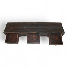 Load image into Gallery viewer, Detail view of vintage Chinese elm wood sideboard showing aged black patina and drawers.